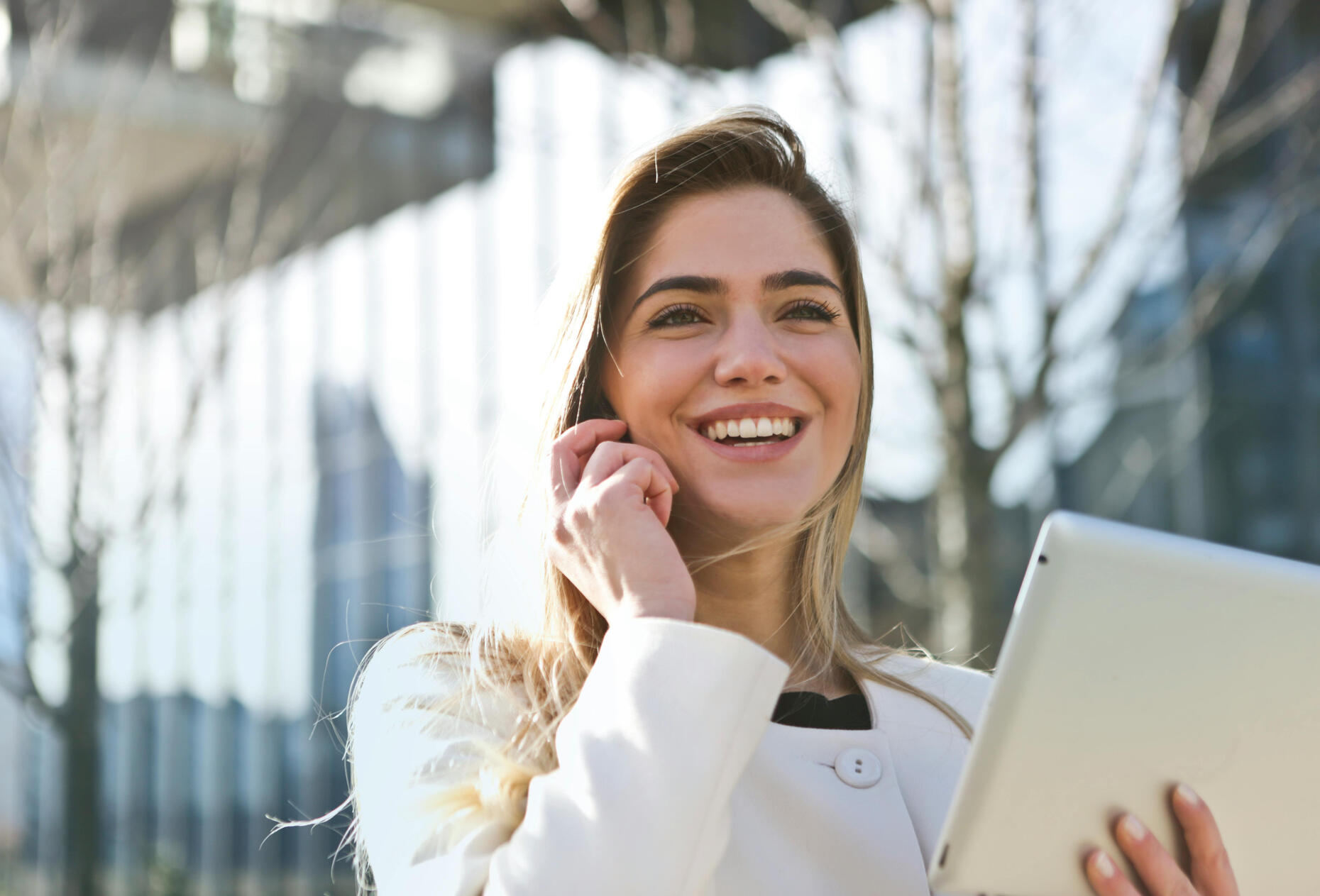 Travel agent assisting with confirmed flight bookings